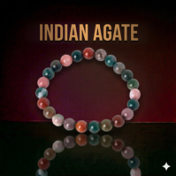 A bracelet of Indian Agate stones from Seamoss Africa, used for grounding and protection.