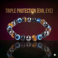 A bracelet of Triple Protection Evil Eye stones from Seamoss Africa, used for aura shielding and grounding.