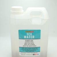 A premium bottle of mineral-rich Sea Water 2L from Seamoss Africa, used for skin health and therapeutic mineral support.