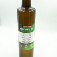 A bottle of Macadamia Oil 500ml from Seamoss Africa, a premium, multi-purpose oil for cooking and skincare.