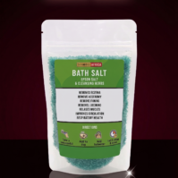 A bottle of Bath Salt with Epsom Salt and Cleansing Herbs from Seamoss Africa, used for muscle relaxation and spiritual cleansing.
